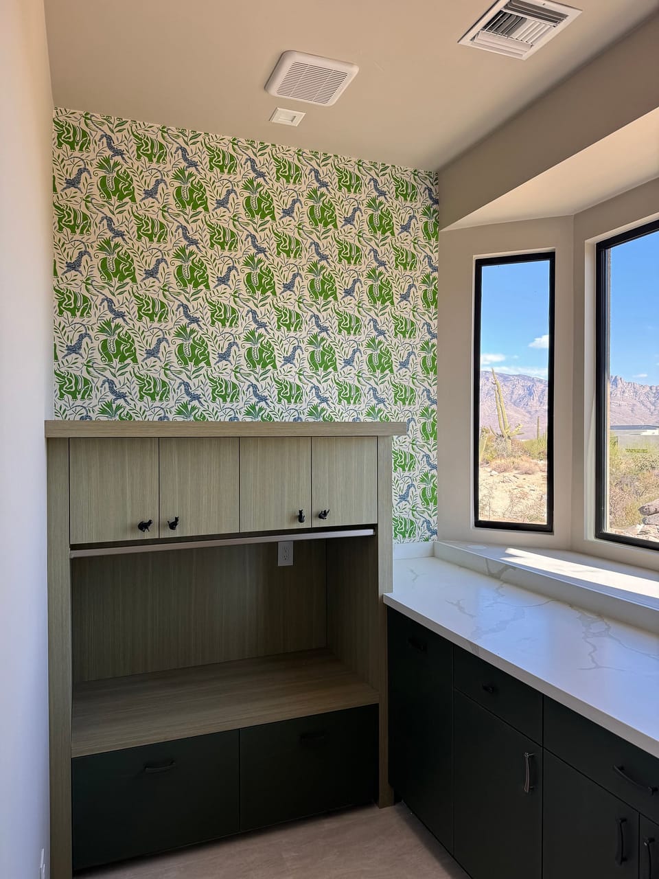 Christopher Farr pattern around a window seat