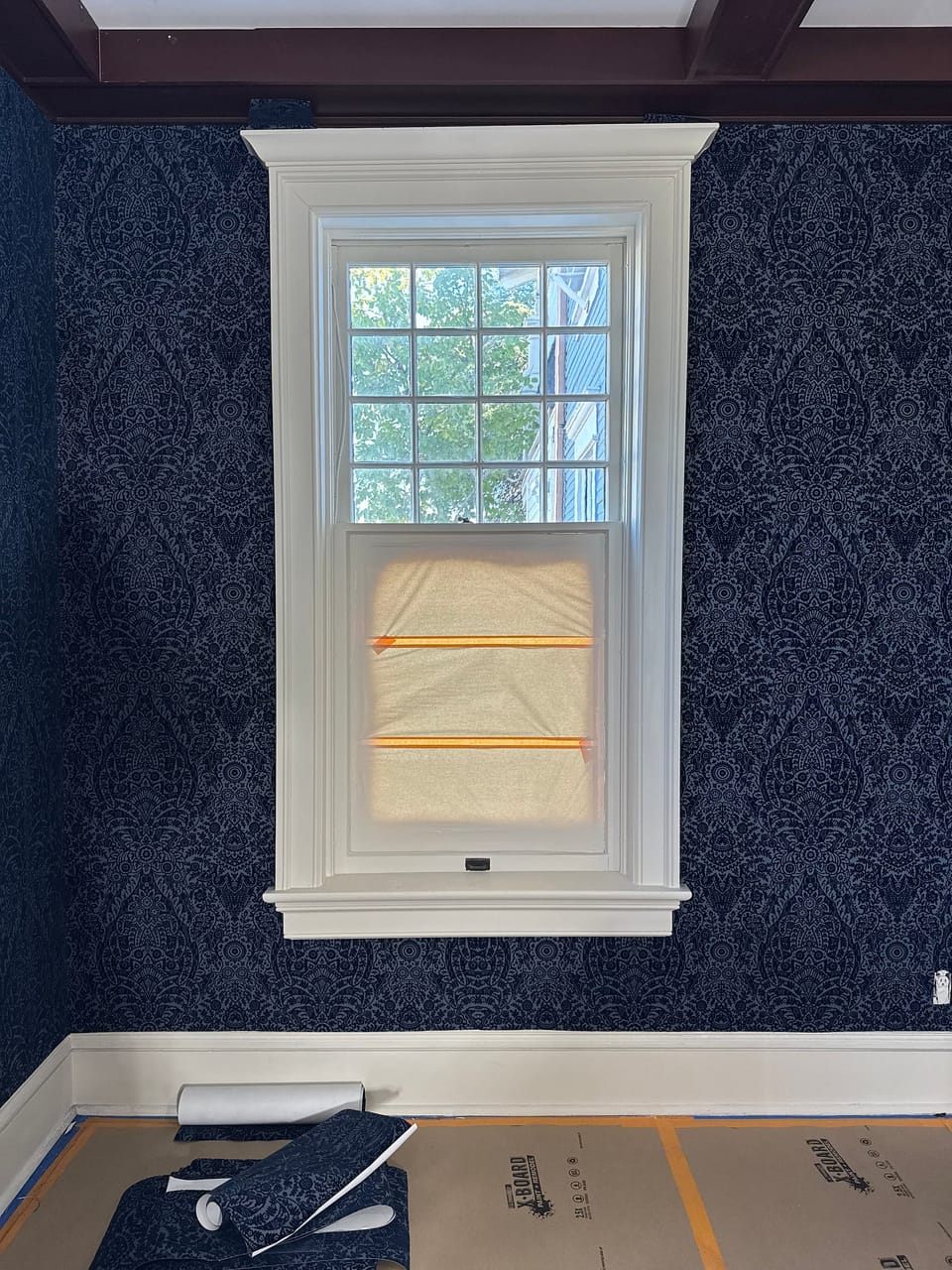 Damask around a sash window