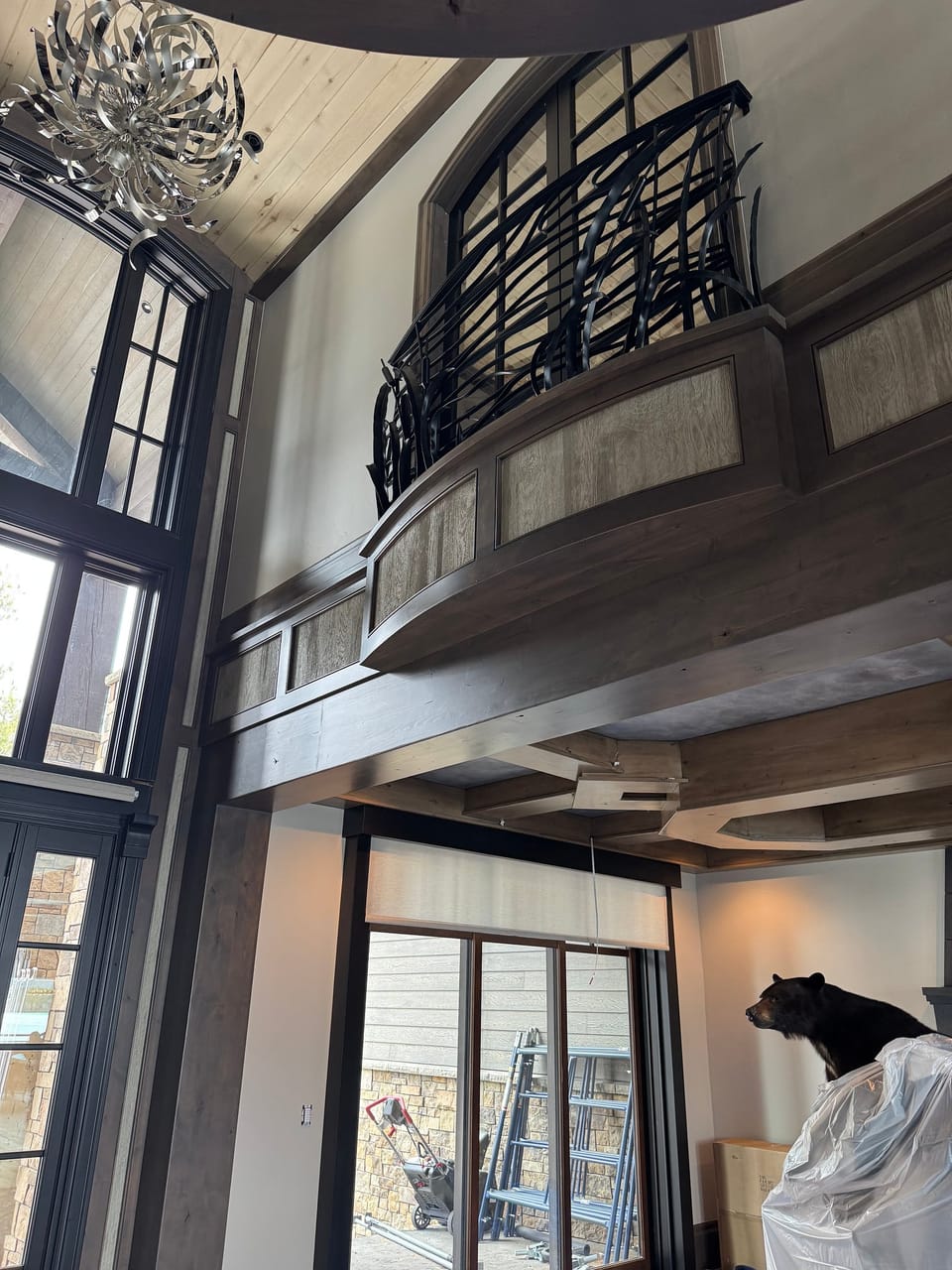 Faux wood around the stairwell balcony