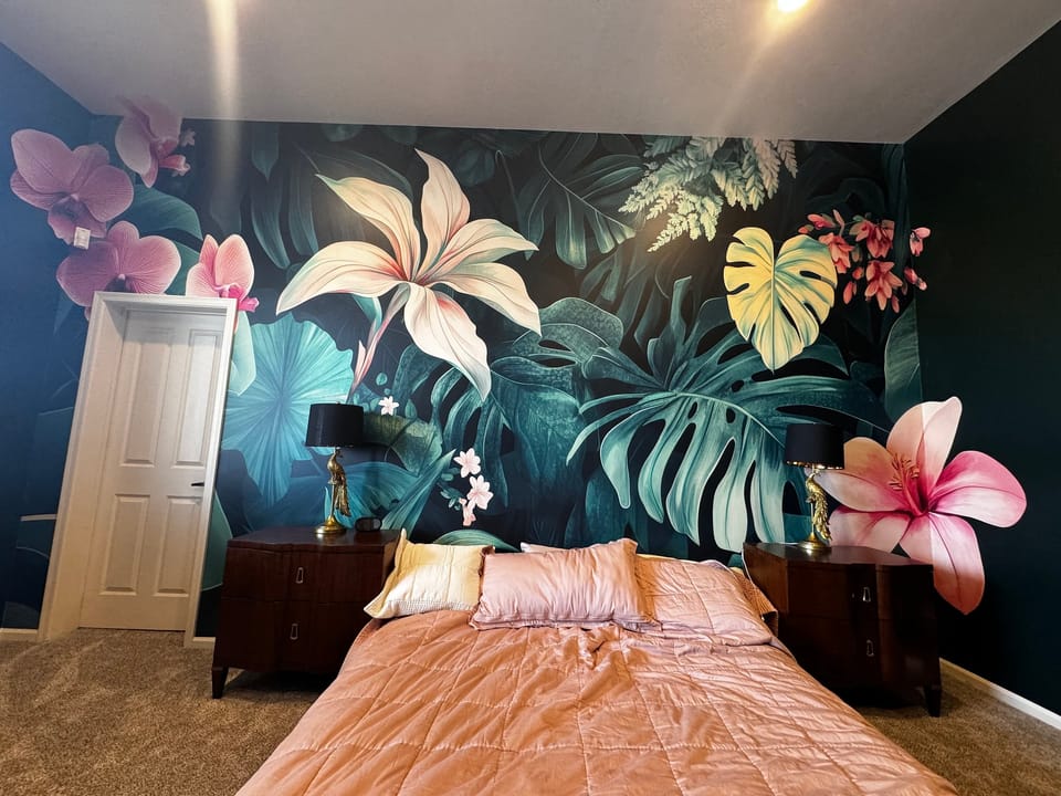 Floral mural on a headboard wall