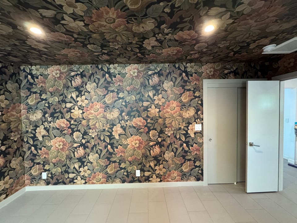 Floral mural on the walls and ceiling of a room