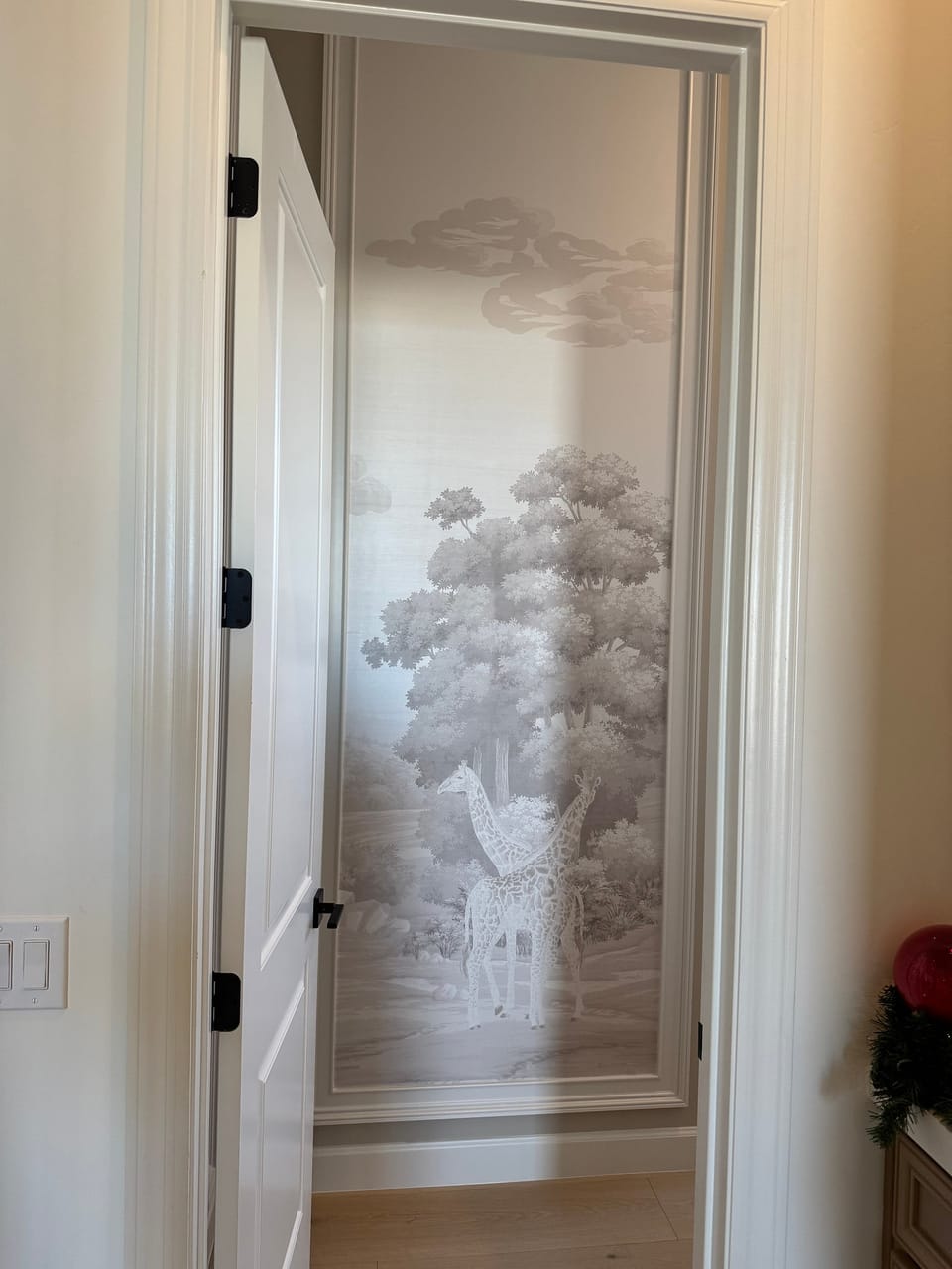 Fromental panel on the bedroom wall