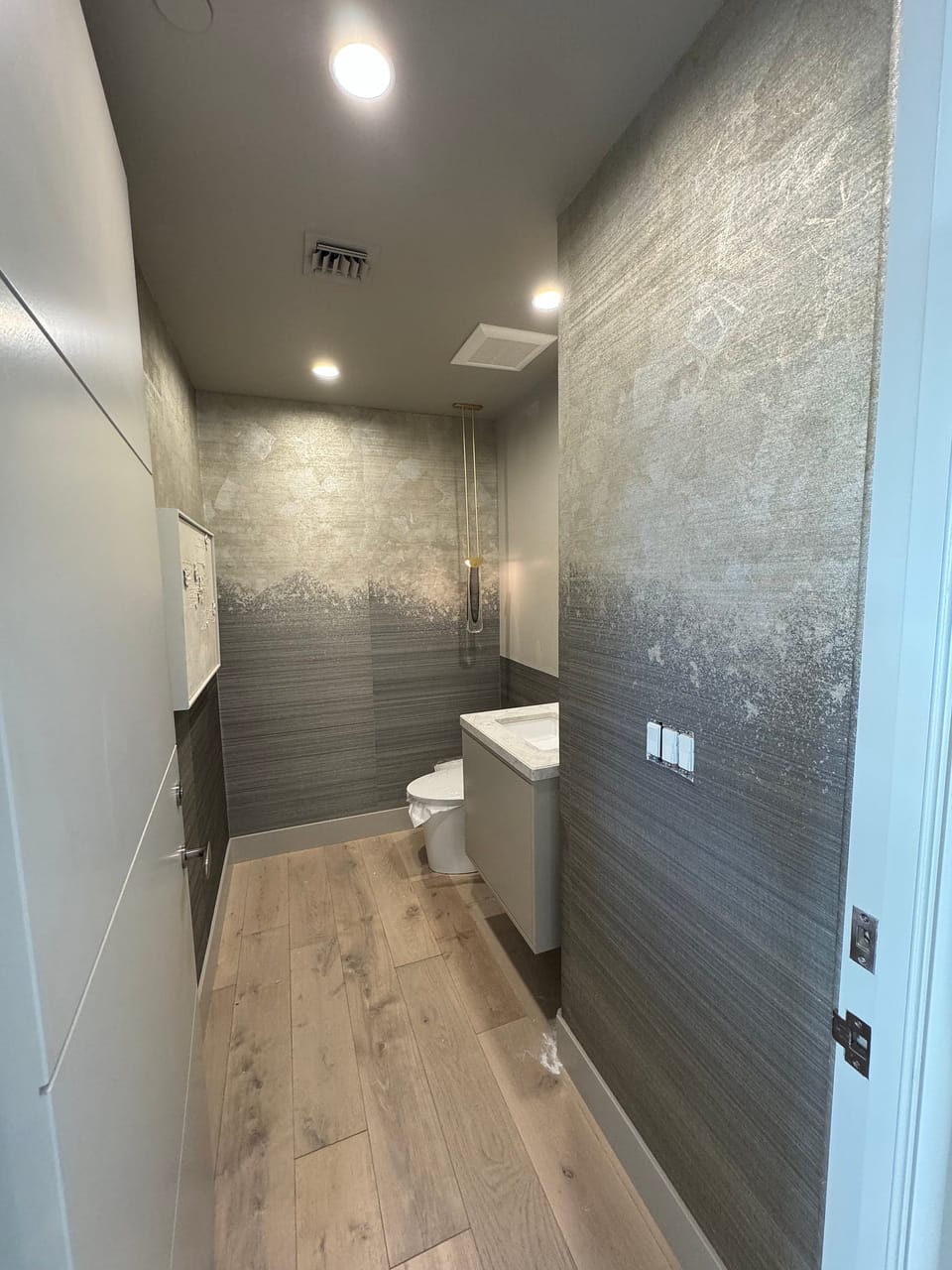 Gold leaf ombre in a bathroom
