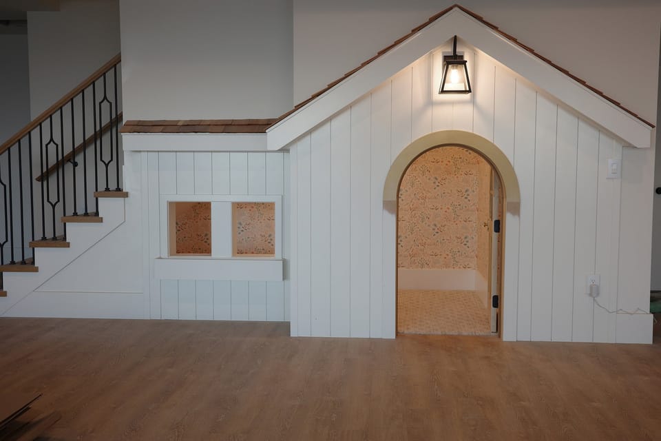 Playhouse front under the stairs