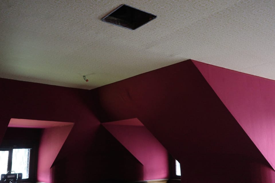 Red fabric sidewalls and dormers under the new ceiling
