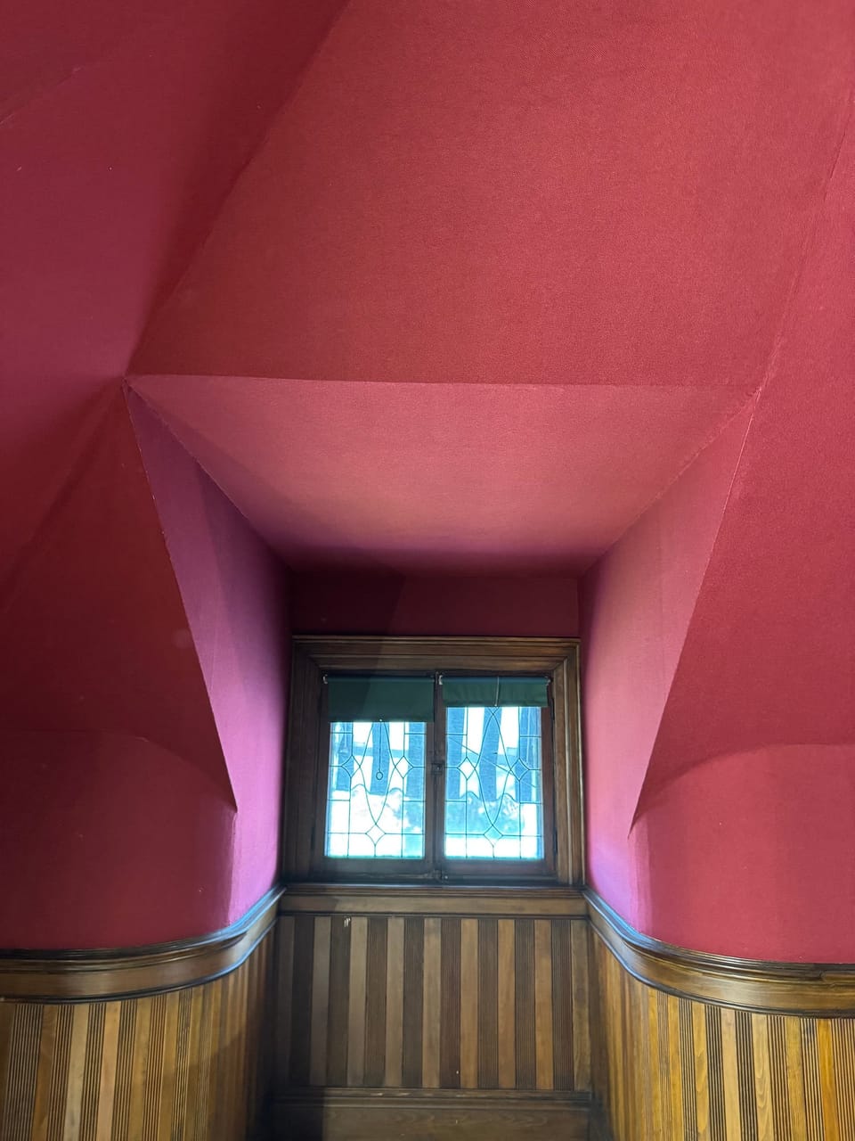 Red sidewall fabric around a dormer window