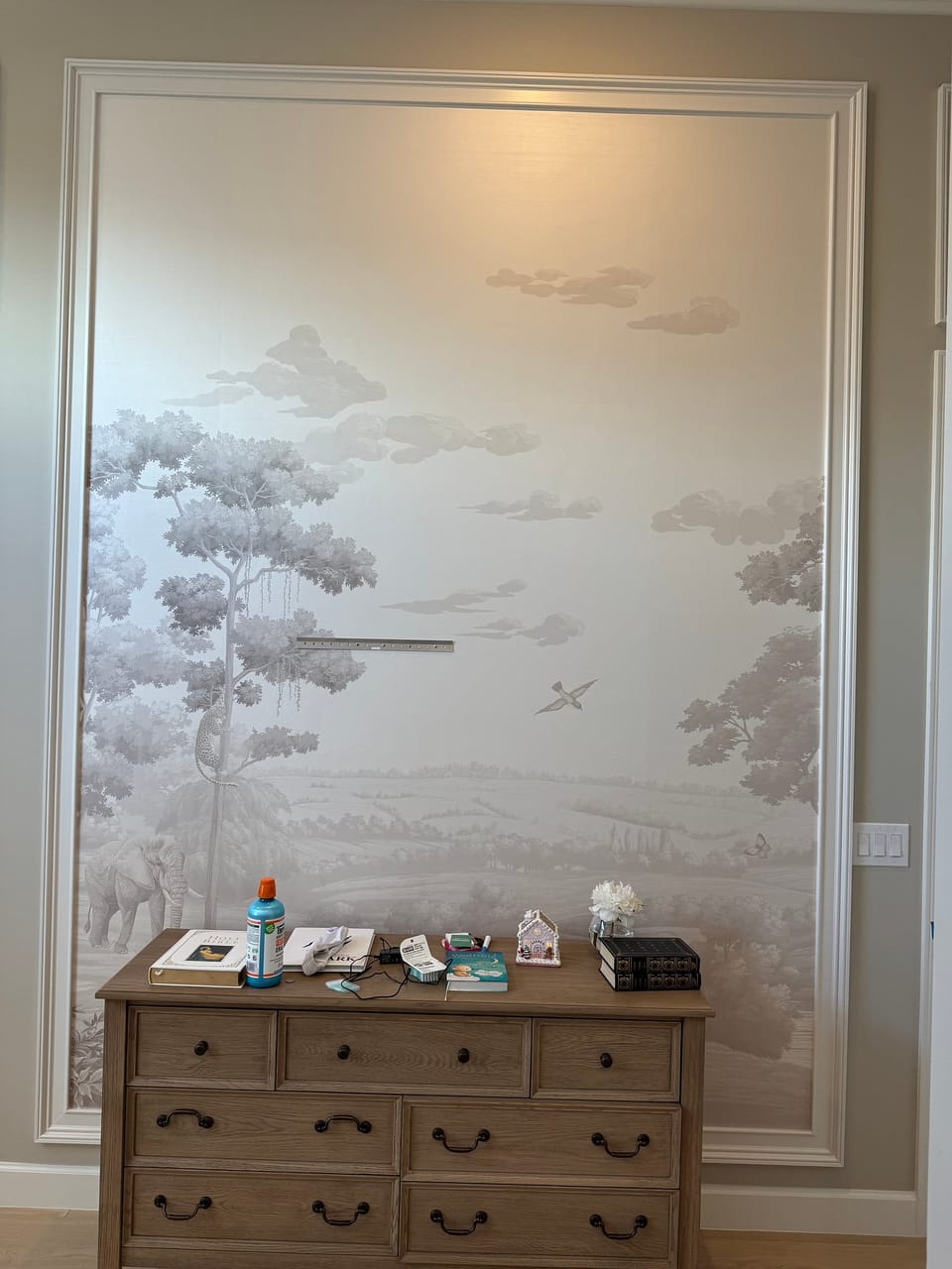 Scenic silk panel above a desk