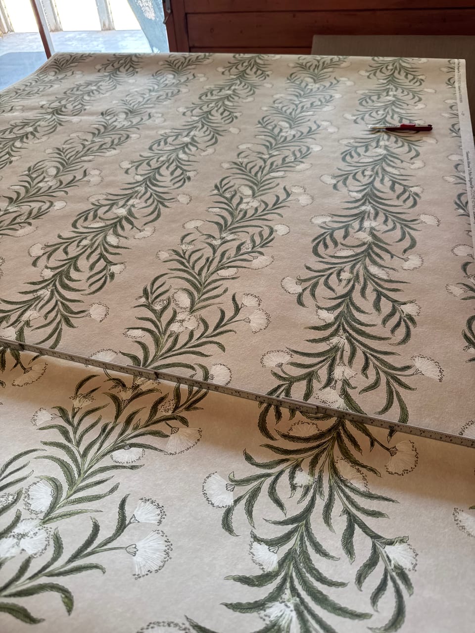 Schumacher trellis material in powder bathroom