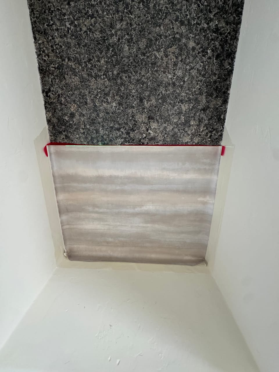 The horizontal seam inside the cubby