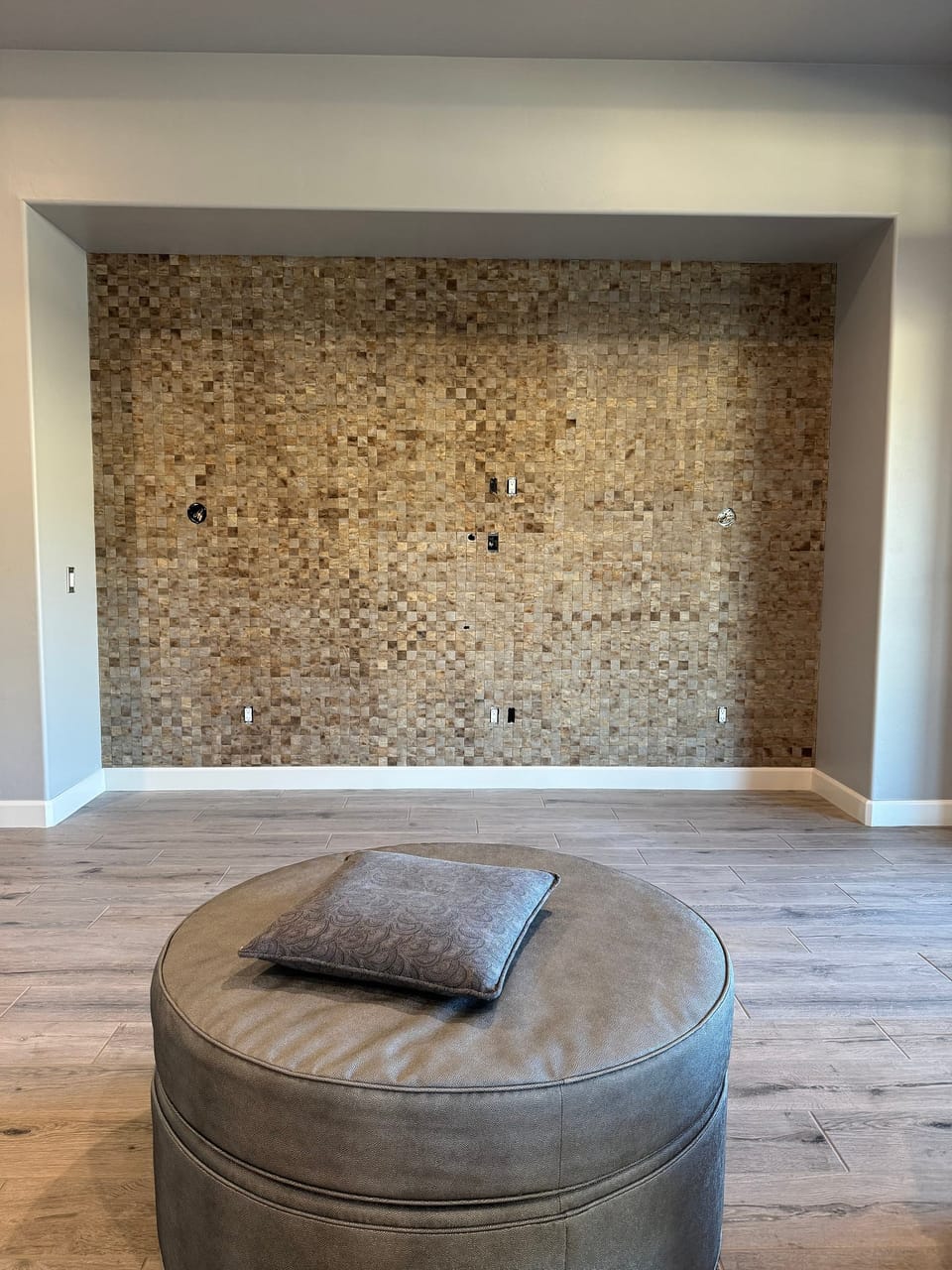 Woven wood wall before the TV went up